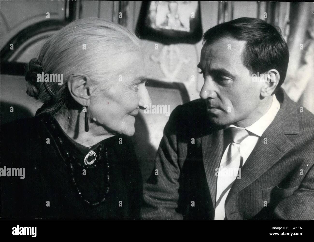 Sep. 09, 1961 - She starts her career at 85 In the film ''Horace 61'' now in the making,Charles Aznavour the famous French singer and screen actor,will have quite an unusual partner: Madame Annette Pietri who has never acted before and starts her caareer as a screen actress at the age of 8585.She is playing the role of Aznavour's aged aunt and does it quite well! She has been selected by the film director who happens to be her nephew(Which may explain things). Ops: Charles Aznavour and his partner Madame Annette Pietre. Stock Photo