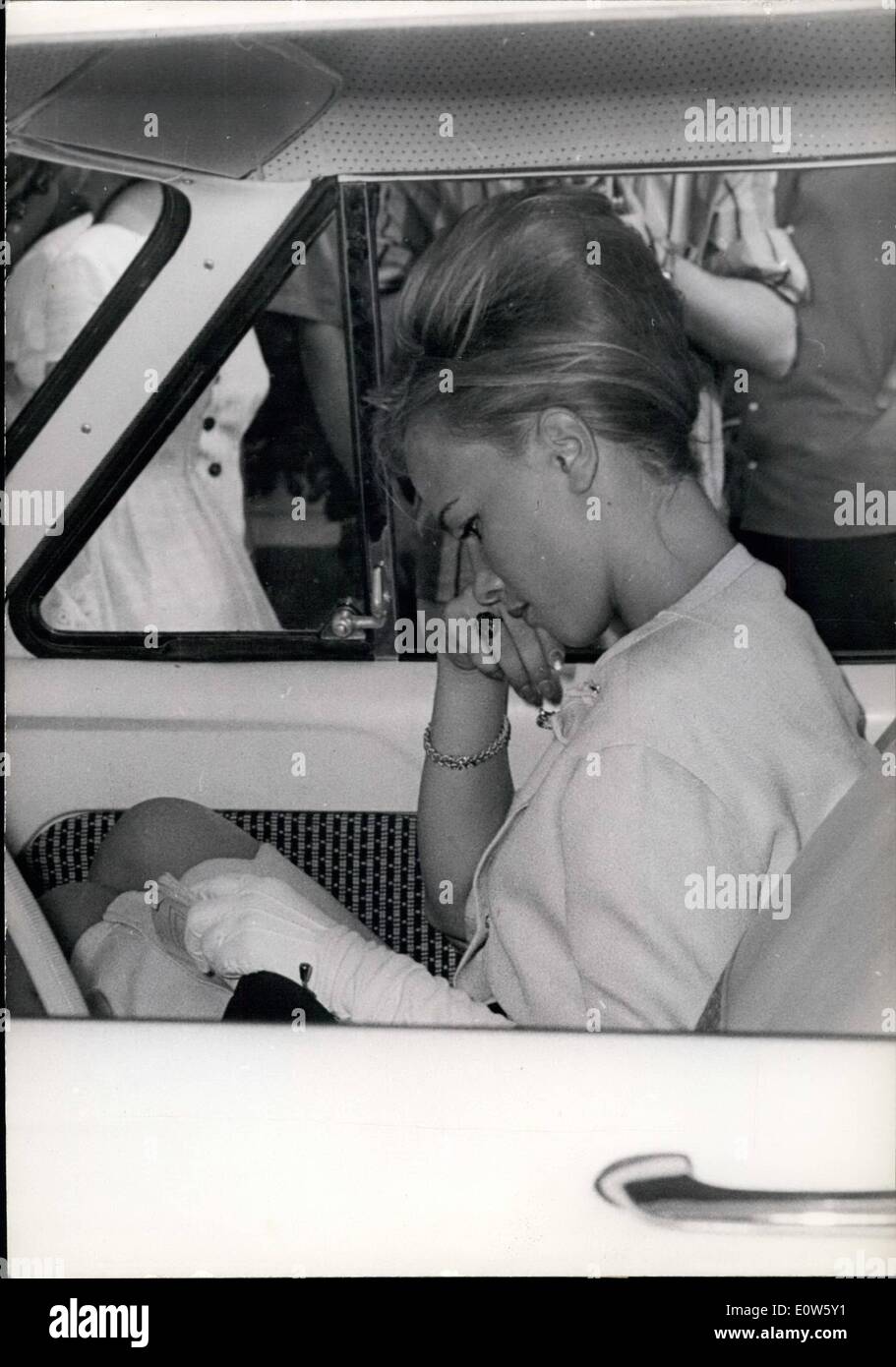 Jul. 07, 1961 - Anouchka joins Karim: Anouchka, who he reported to be engaged to Karim Aga Khan, arrived in Nice on her way to join Karim someone on the Riviera. Photo shows Anouchka pictured in her car as she arrived in Nice yesterday. Stock Photo