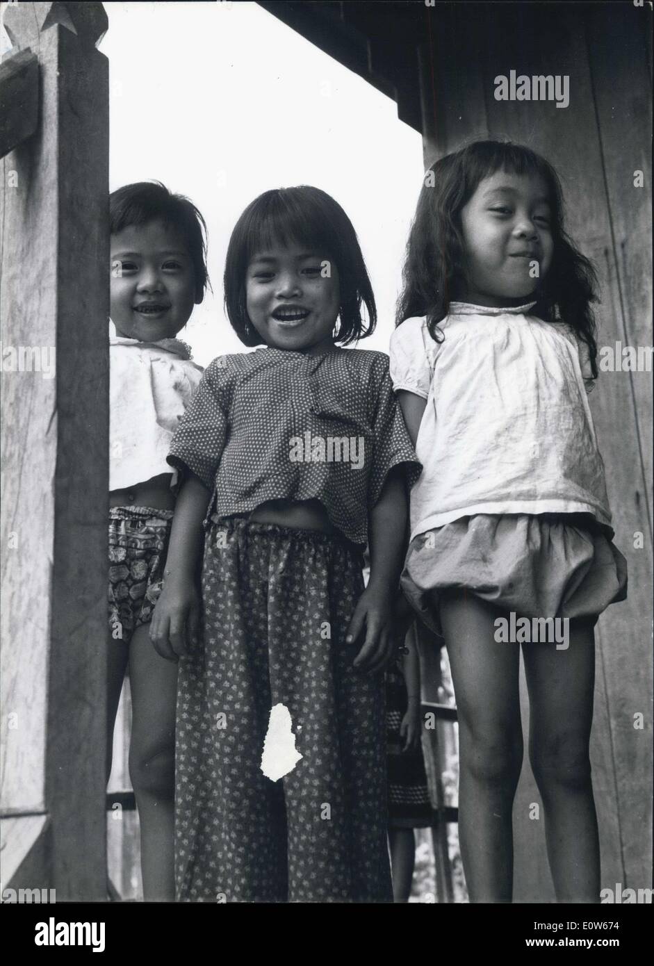 Aug. 04, 1961 - Three happy and smiling youngsters in Cambodia. Stock Photo