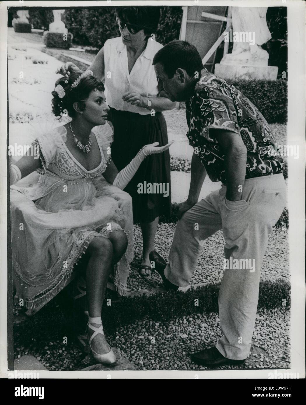 Aug. 08, 1961 - Sophia Loren making new film - Madame Sans Gene at Rome: Italian cineactress Sophia Loren stars in a new film ''Madame Sans Gene'' being made at the Tirrenia Studios, near Rome. Photo Shows Sophia Loren and director Christian Jacques on the set of the film near Rome. Stock Photo