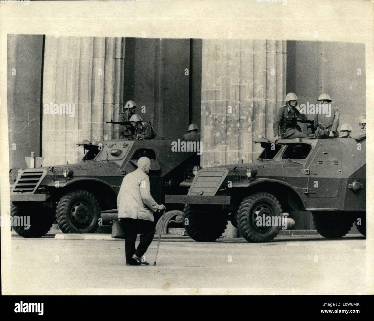 Aug. 08, 1961 - ''They shall not pass '' . Not even old men armored scout cars at Brandenburg gate bar way to old man wanting to be to east Berlin this old west Berliner hobbled his way, helped by a cane, up to the Brandenburg gate yesterday only to be turned back by armed East German police and troops, sealing the border. The man, too old to understand why international situations should stop him from traveling freely in his city, argued, but to no avail. he was forced to return home. Stock Photo