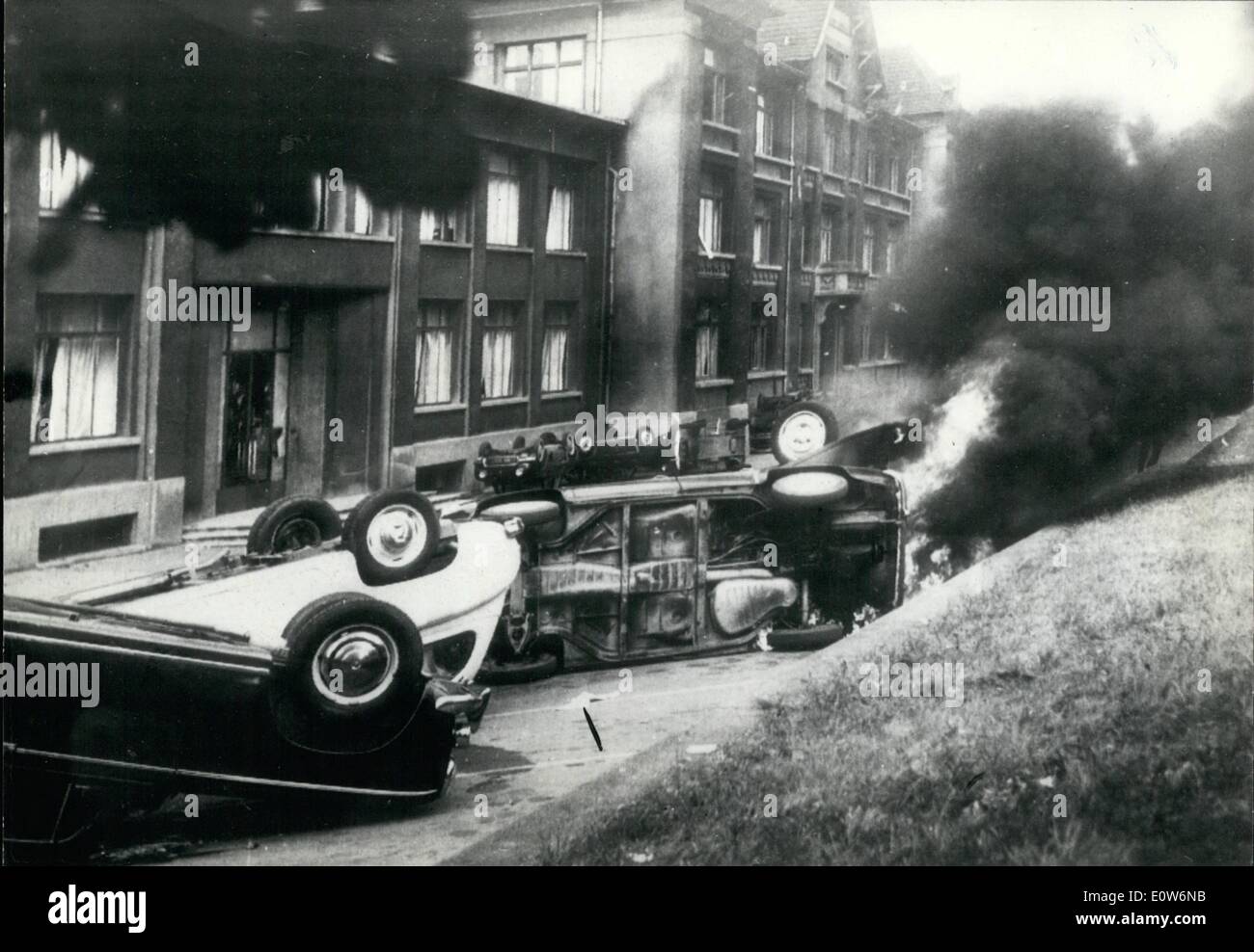 Aug. 08, 1961 - Riot Scenes in Merlebach After Mine Disaster: Riots broke out in Merlebach (ALSACE) mining district after demonstrations staged by the miners demanding the increase of safety measures after the recent mine disaster. Photo shows burnt out cars in front of the management building. Stock Photo