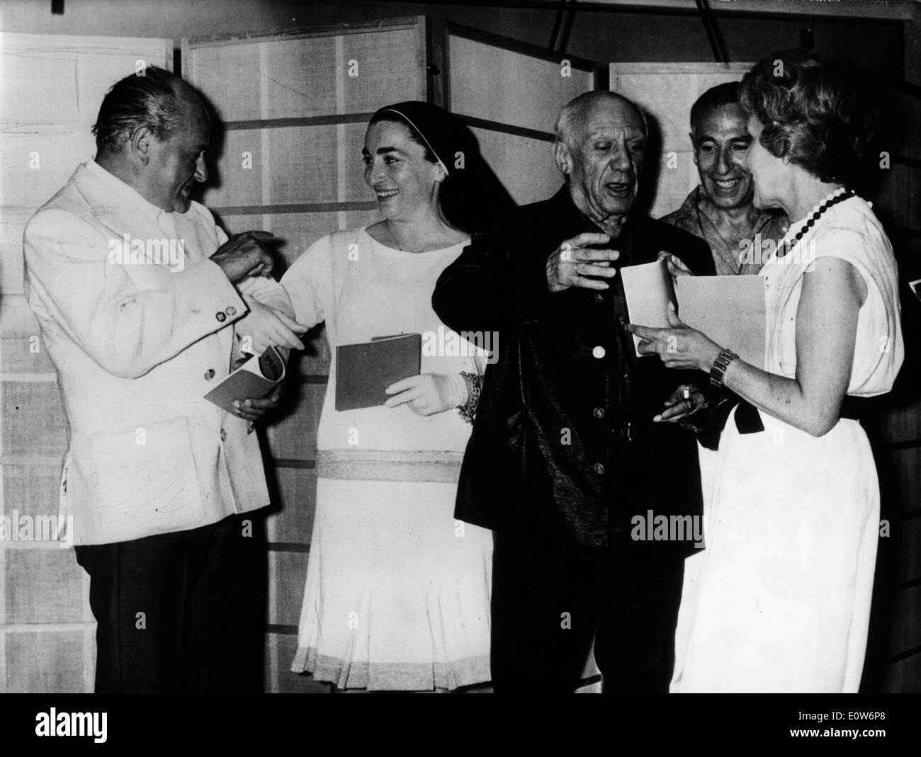 Artist Pablo Picasso with Mademoiselle Ramier and his wife Jacqueline Roque at his gallery exhibition Stock Photo