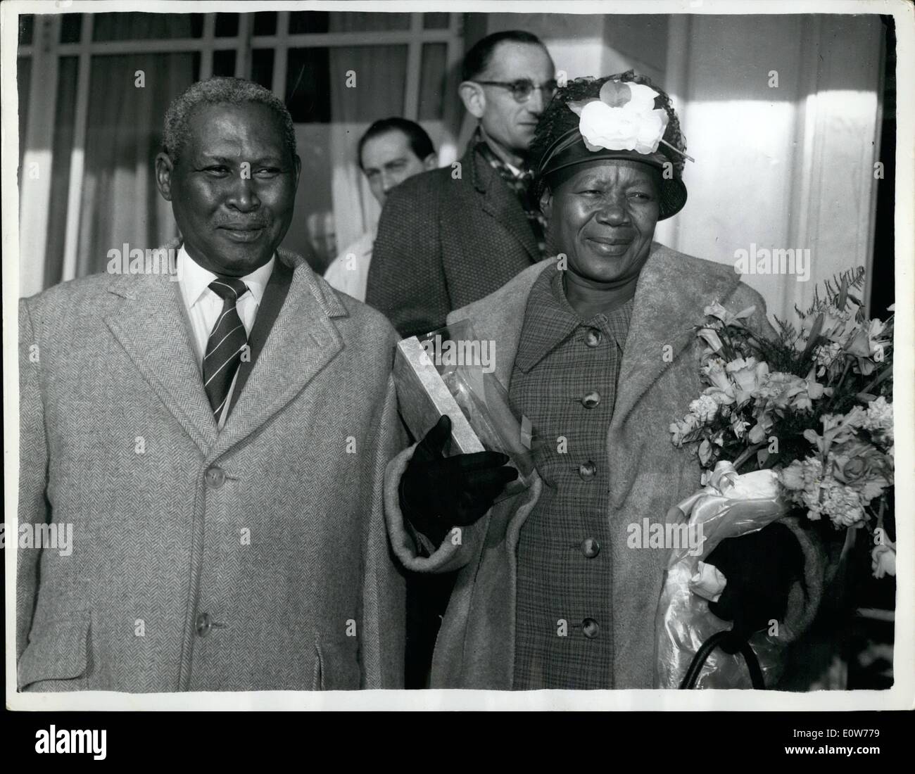 Dec. 12, 1961 - Zulu Chief who Won Nobel Prize Passes Through London For Oslo - Zulu Chief Alebert Lutuli and His Wife, from South Africa, Passed through London on their way to OSLO Where he is to be Presented with the Nobel Peace Prize - Photo Shows: Chief and Mrs Lutuli leaving the Dorchester Hotel in London this Morning for the Airport Stock Photo