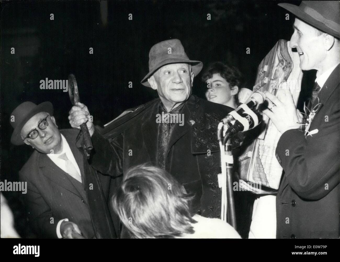 Oct. 10, 1961 - Vallauris and Riviera celebrate Picasso's 80th birthday. Vallauris, the small town in province famous for its pottery decorated by Picasso, celebrated the 80th birthday of the great painter who has been resident in the town for many years. photo shows Picasso holding the huge token key of the city which the Mayor (right) presented him with. At left, Jacques Duclos who was present at the ceremony. Stock Photo