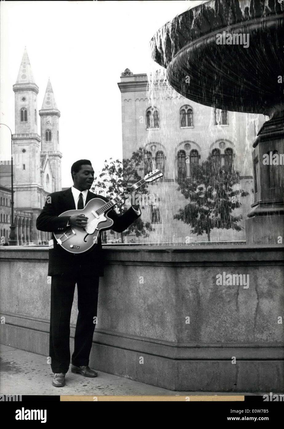 Oct. 14, 1961 - Standing in the Street; in the real sense of the words is the Cuban musician Ciango who so far was a member of a five men band playing in the best and most expensive night clubs of America and Europe. The last time, the five musicians who had left their motherland Cuba under the Battista regime and who did not care to return to the ''Castro Cuba'', had played in Rome, but in Italy and also in Germany foreign musicians may only have limited working permits, and the one for the five Cubans expires on Oct. 15th, 1961 Stock Photo