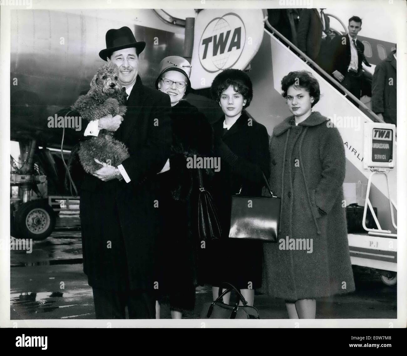 Jan. 01, 1962 - New York International Airport . Jan 4 ,1962 ... Screen and TV star Don Ameche is shown with his wife and daughters Barbera, and 2nd fron right and Cornelia, right and poodle Beau Beau, on their return from Chicago . They reside in New York, Ameche shortly leaves for a trip to Europe Stock Photo