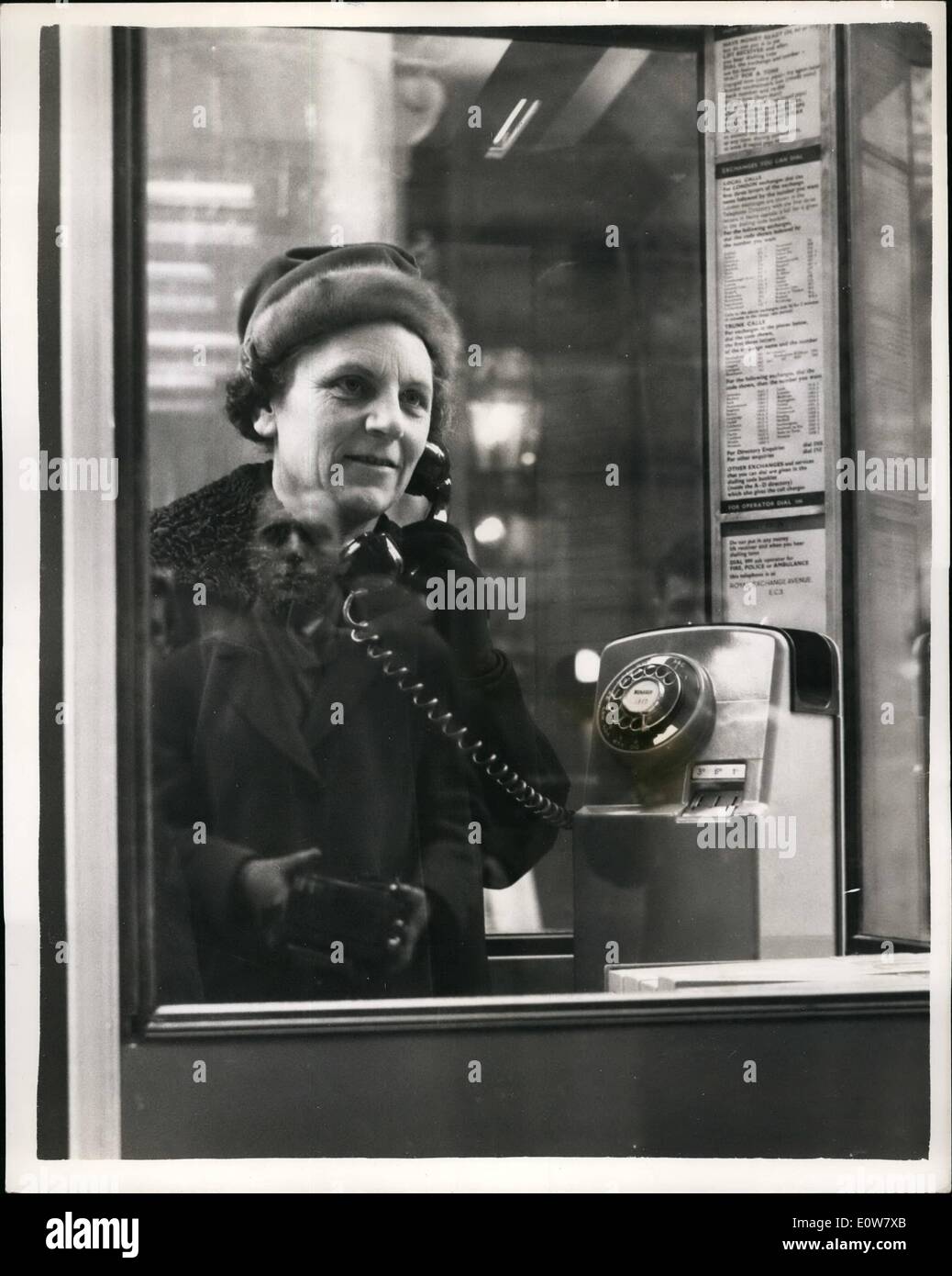 Jan. 01, 1962 - New Design Telephone Kiosk: A new design GPO telephone kiosk was shown in London - near the Royal Exchange - this morning when it was inspected by Miss Mervyn Pike, MP, Assistant Postmaster General. Photo shows Miss Pike in the new telephone kiosk today. Stock Photo