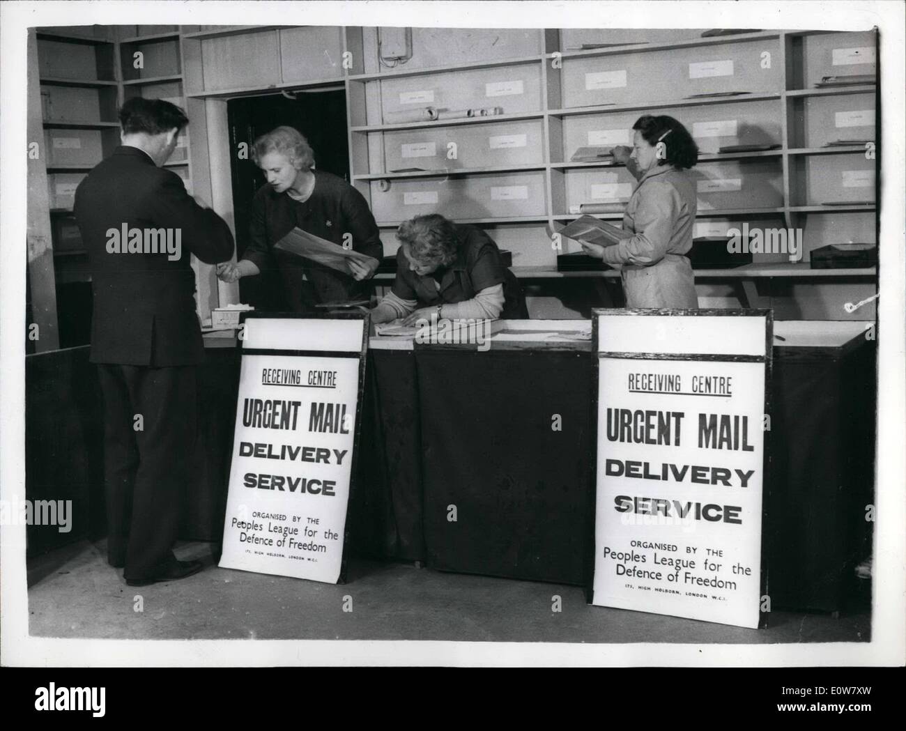 Jan. 01, 1962 - Mail Service Organized to beat the GPO go-slow: A service for urgent ail is being organized to beat the GPO workers' go-slow campaign by the people's League for the Defence of freedom. The Service - with receiving centers in London and 29 other cities - stars tomorrow. The London center is in Baker- street where staff were busy preparing for the opening this afternoon. Picture shows: Members of the Service's tsaff getting ready at the aker- street mail receiving center this afternoon. Stock Photo