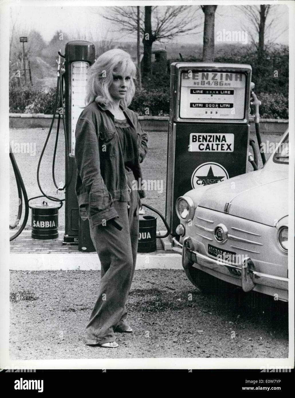 Jan. 01, 1962 - A Blonde Gina Lollobrigida plays ''Benzinara'' in new Italian Film: Gina Lollobrigida plays the role of a ''Benzinara'', a service station attendant, in a new film ''The Ippolita's Beauties'', which is currently being made in Italy. Photo Shows Gina Lollobrigida as she appears in the film. Stock Photo