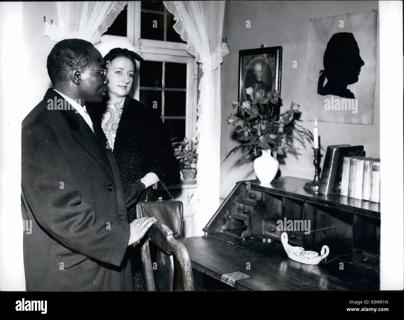 Nov. 11, 1961 - President Senghor visits the Frankfurt Goethahouse President SENGHOR of Senegal,who made an official Visit to West.Germany, visited- the famous Goethe House, in Frankfurt today before he left for Paris /-.-Senghur, who is a great Goethe lover stopped for a lung, time at the desk where foethe worked.with his is his french born wife Stock Photo