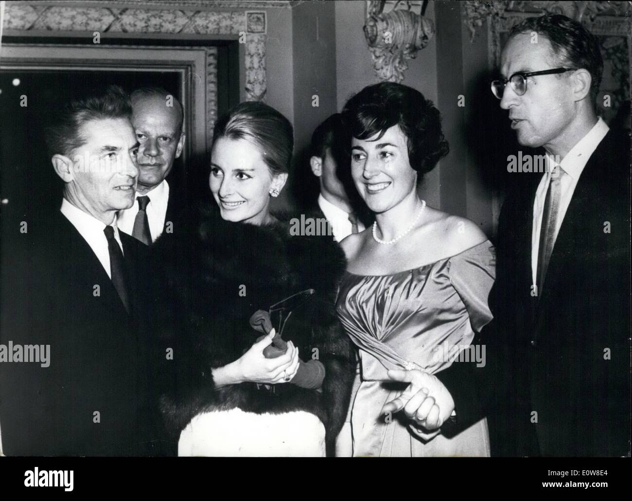 Nov. 11, 1961 - Karajan in Chicago: Famous German conductor Herbert Von Karajan who is on a tour through the USA with the Berlin philharmonics was received by the German Conuel General in Chicago, Dr. Guenther Motz (right with his wife). Karajan had a big success with his concert in chikago.( Karajan and his wife at left) Stock Photo