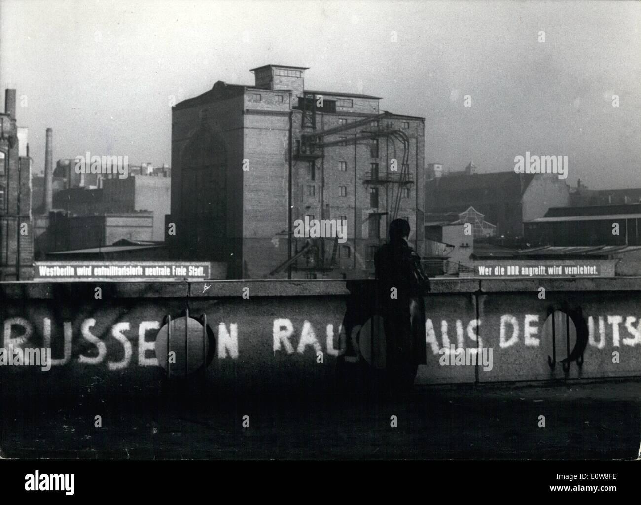 Nov. 11, 1961 - :Catchword - war '' at the banks of the Spree river in Berlin.: On the western banks of the Spree river in Berlin youth has written ''Russian go home from Germany''. At the eastern banks of the river the official catchwords of the Ulbricht-regime ''West Berlin will be a Free Town without militares'' - left side - and ''Who attacks the DDR will be destroyed'' - right side - are put on now. Stock Photo