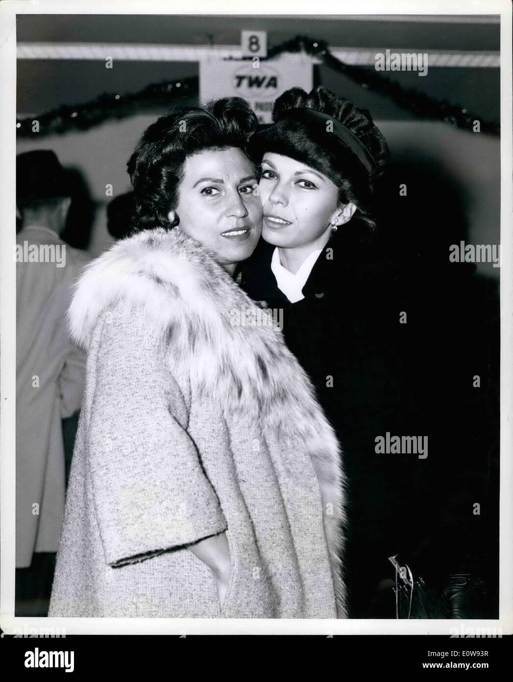 Dec. 12, 1961 - New York International Airport: Nancy Sinatra, ex-wife of singer-actor-producer Frank Sinatra, is shown being greeted by daughter Nancy on arrival from Los Angeles via TWA SuperJet. She is here to spend the Christmas holidays with her children and will stay at daughter Nany's New York apartment while latter's husband, singer Tommy Sanda, is abroad. Stock Photo