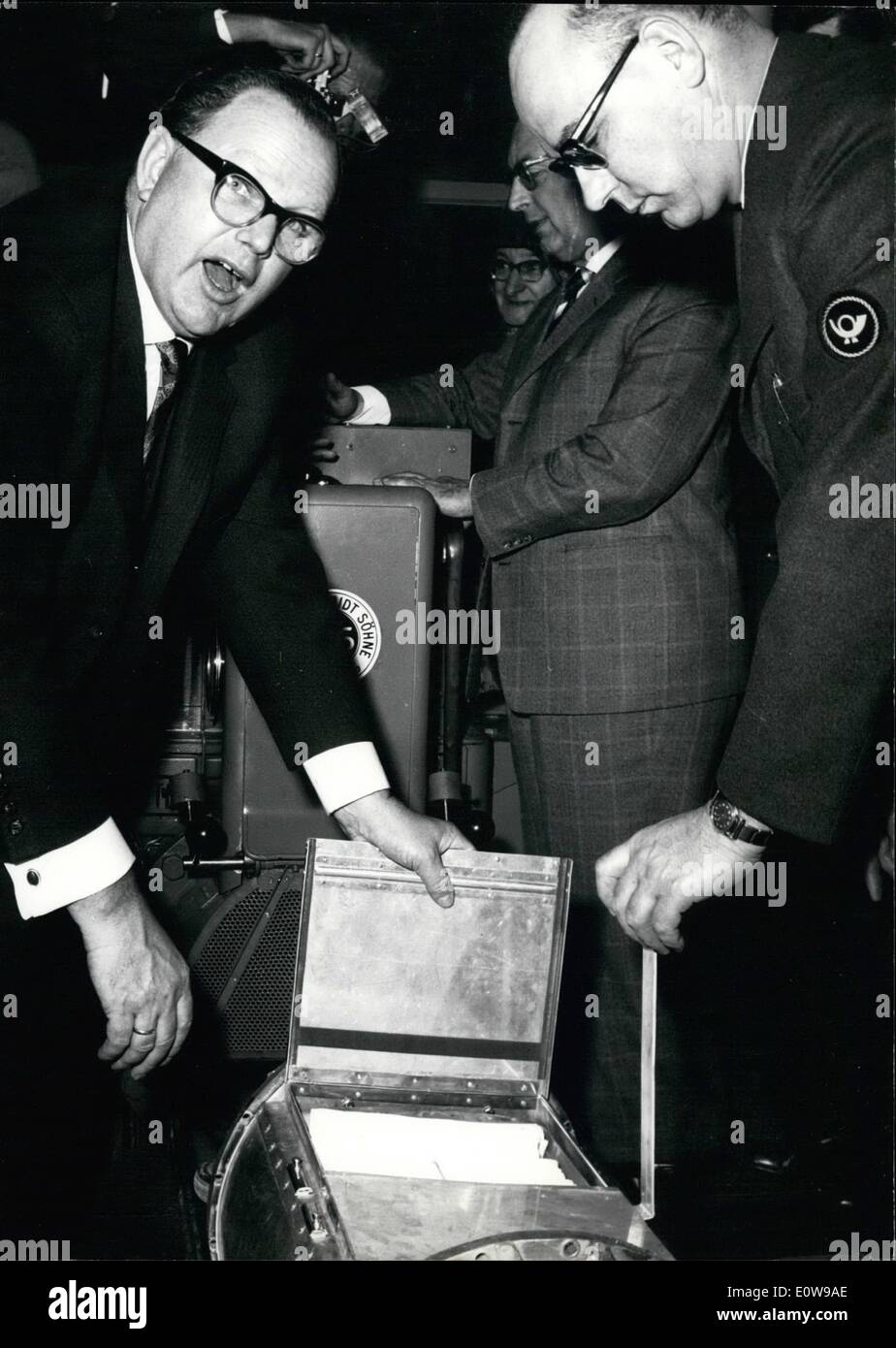 Feb. 02, 1962 - About 1.3 million Deutsche Mark; was invested in the first German big pneumatic post office which was enaugurated today in Hamburg. The ''historical pressure'' sending the first official box to the 1.8 km long distance, was affected by the German Minister of Posts, Mr. Stucklen. The experimental installation which is also the biggest in Europe, will follow others in all towns of the Federal Republic of Germany, with more than 100.000 inhabitants Photo Shows Assisted by an expert the German Minister of Post, Mr. Stucklen started the first official box at the 1 Stock Photo