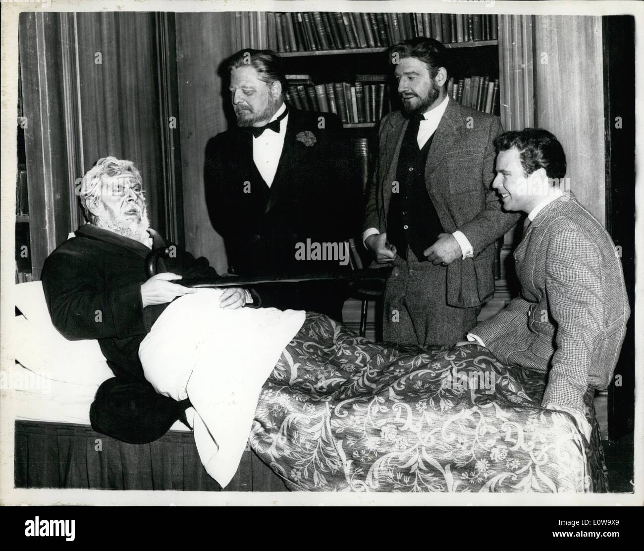 Apr. 04, 1962 - PETER USTINOV'S NEW PLAY. PETER USTINOV'S new play, PHOTO FINISH, opens tomorrow bight at the Saville Theatre, London. PHOTO SHOWS: PETER USTINOV, as Sam, in bed: on the far side of it are three members of the cast who portray ''Sam'' at different ages, left to right: WENSLEY PITHEY, 60, ROBERT BROWN, 40, and EDWARD HARDWICKE, 20. Stock Photo