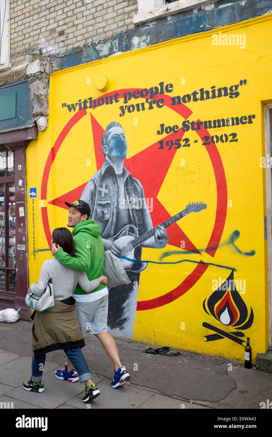 'Public School Phoney' on Joe Strummer mural off Portobello Road London Stock Photo