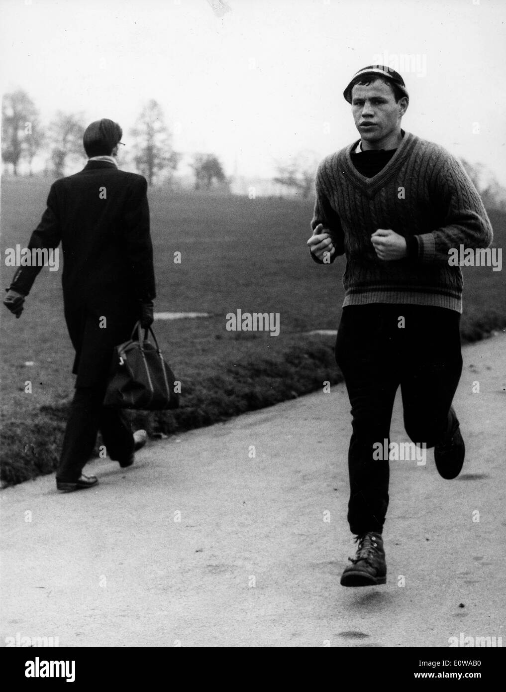 Boxer Terry Downes out running to train for a match Stock Photo