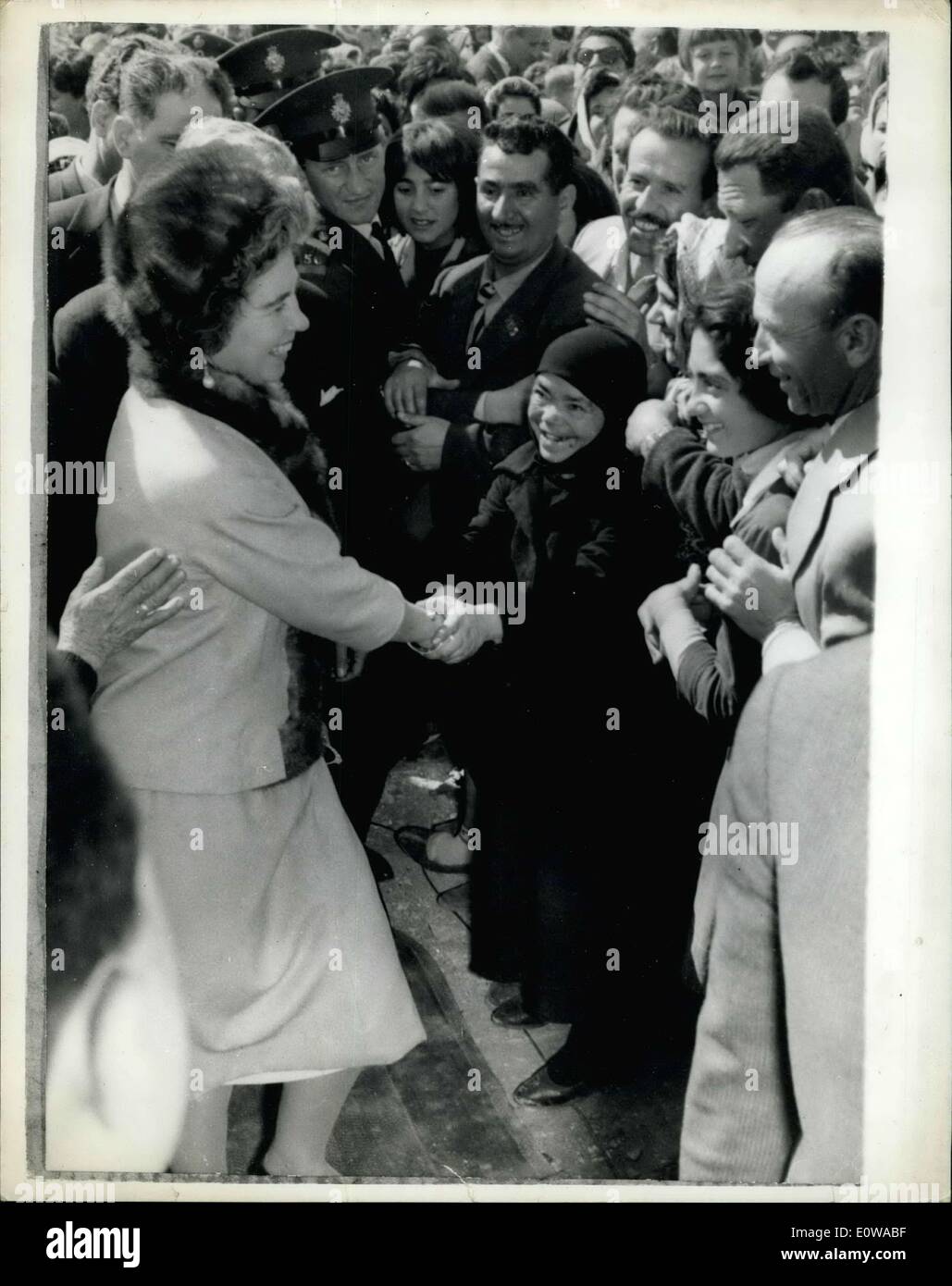 Mar. 16, 1962 - THE GREEK ROYAL FAMILY ON TOUR OF CENTRAL GREECE.. A HAPPY GREETING FOR THE QUEEN.. Native workers have a very warm welcome for Queen Frederica when she inaugurated the foundation of popular homes - during her tour with other members of the Royal family - of Central and Northern Greece. Stock Photo