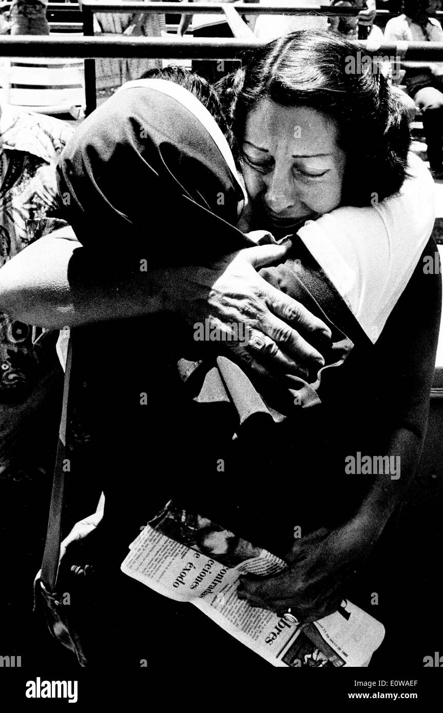 Cuban Refugee hugs nun after a church service Stock Photo