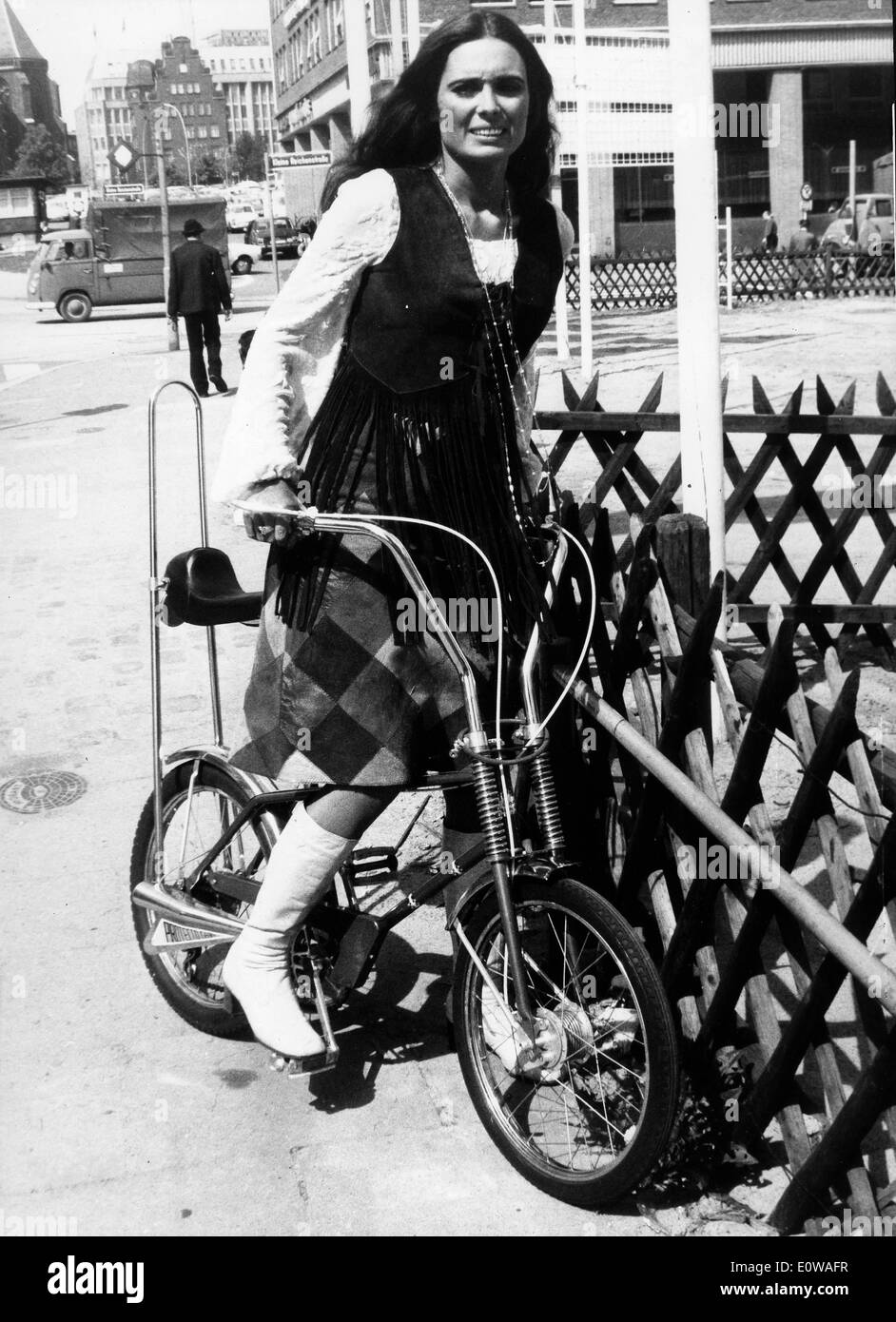 Actress Daliah Lavi rides a bike Stock Photo