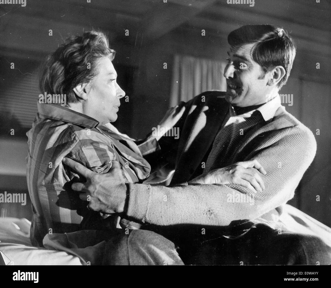 Actor George Lazenby and co-star in film scene Stock Photo