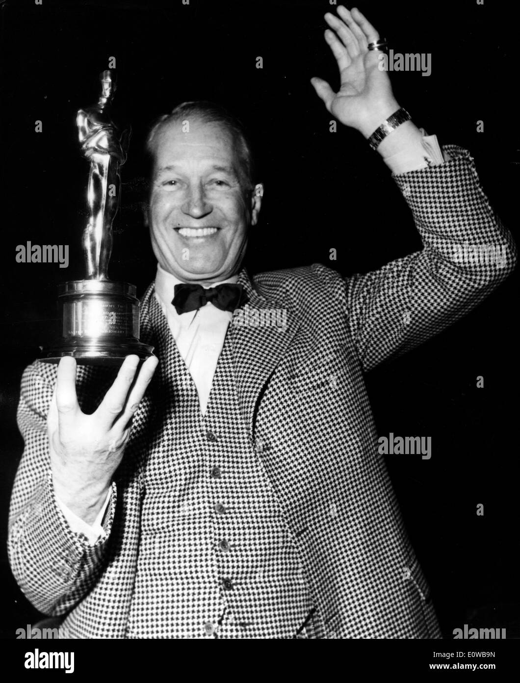Actor Maurice Chevalier shows off award Stock Photo