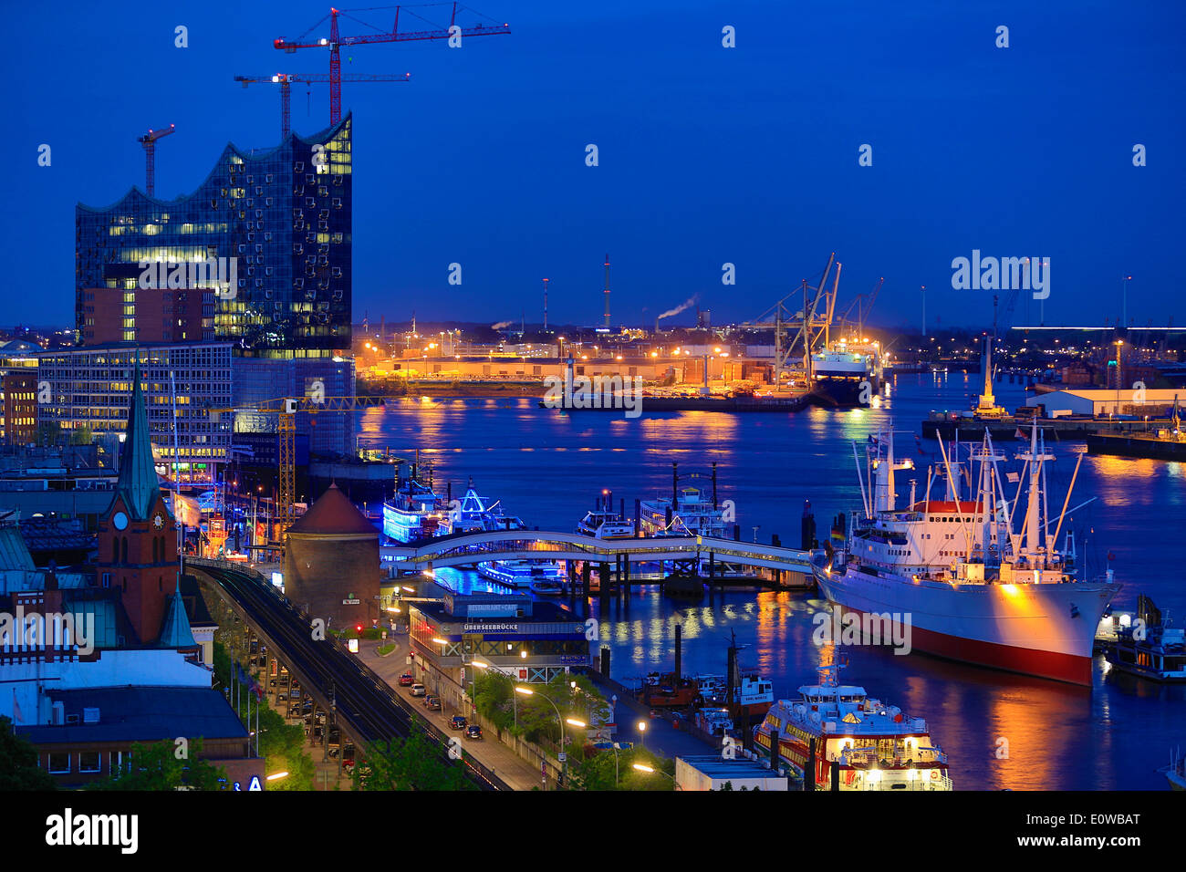 Elbe River with the museum ship Cap San Diego and Elbe Philharmonic Hall, at dusk, Hamburg, Germany Stock Photo