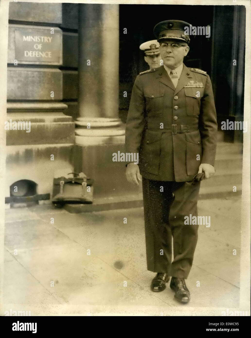 May 05, 1962 - Us marine corps commandant meets minister of defense: general David M. Shoup, commandant of the united states marine corps, who is currently visiting Britain. This afternoon called on Harold Watkinson, the minister of Defence, at the ministry. Photo shows General leaving the ministry after his visit this afternoon. Stock Photo