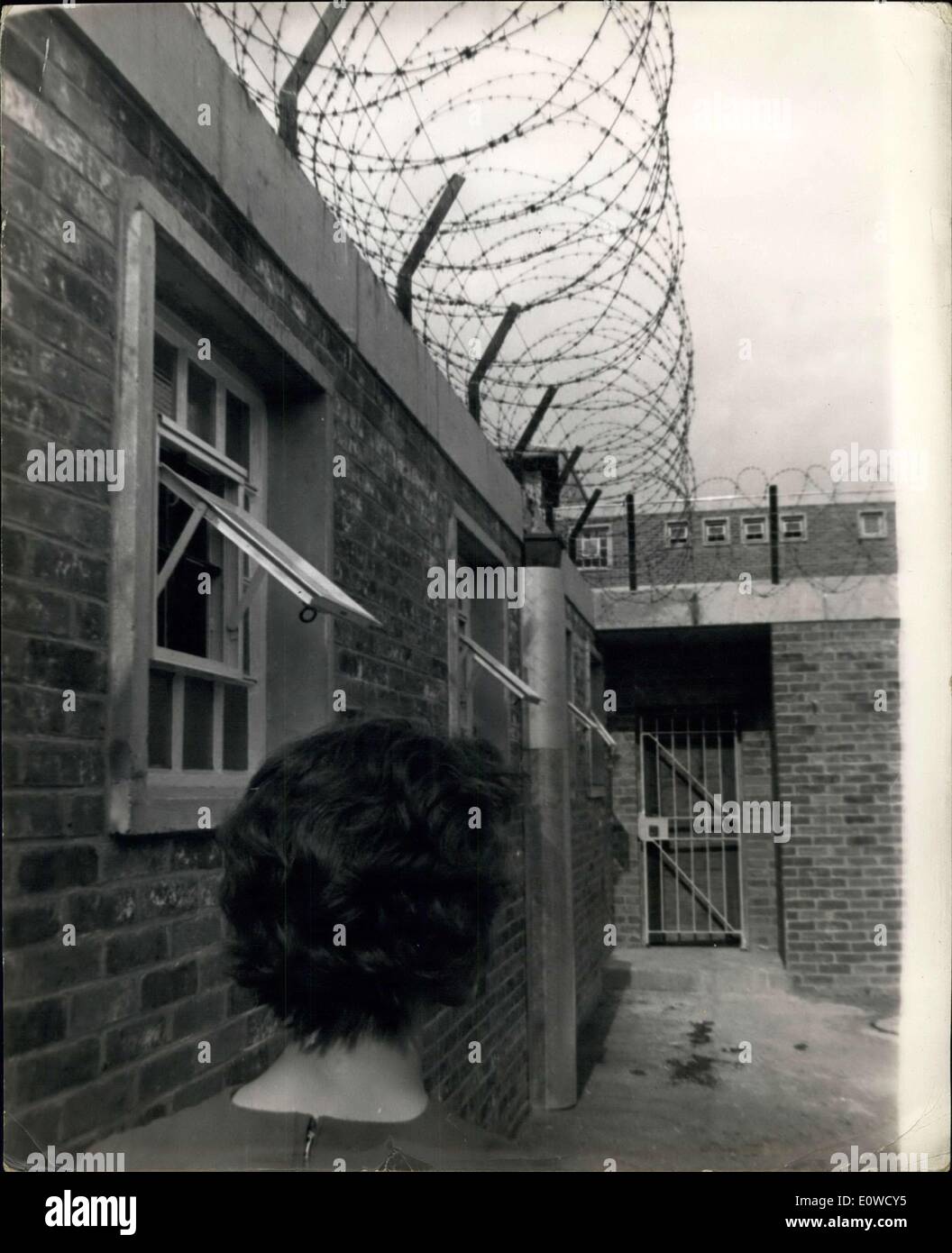 May 16, 1962 - Borstal for persistent girl offenders.: The first inmates will arrive at a new Borstal for persistent girl offenders 21 at Bullwoo', near Hockley, Essex, girls will face hard work and strict in what the Home Office calls a coure ''Boratal. It will house 96 offenders - from six months to two years. Photo shows A girl seen in the Punishment Block Exercise yard, whose walls are surmounted with barbed wire. Stock Photo