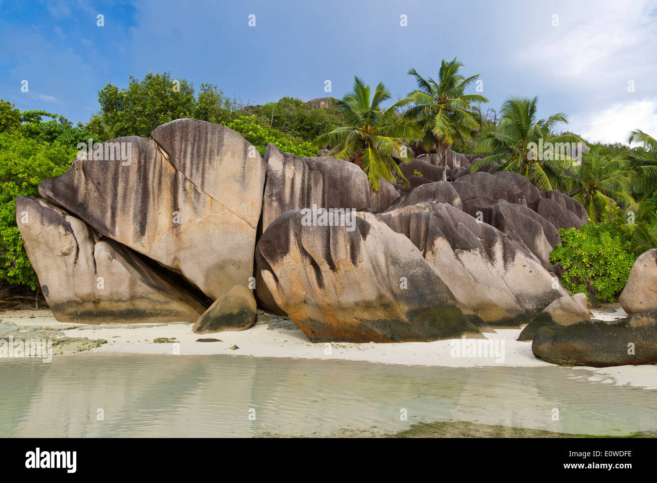 Granite boulders and coast of La Digue island. Seychelles Stock Photo