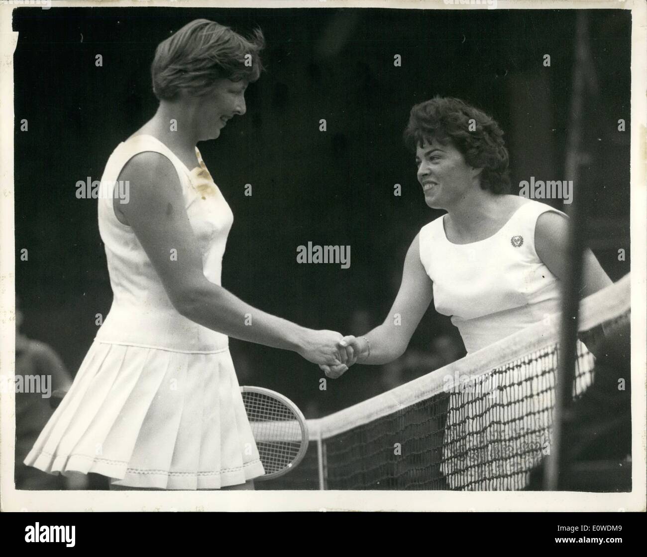 Jun. 06, 1962 - Wimbledon tennis championship -third day. Christine wins  match in twenty minutes. photo shows Christine Truman is all smiles as the  shakes hands with Miss E.A. Green (n.z) after