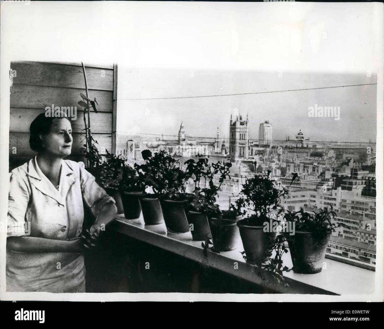 Oct. 10, 1962 - Rooms with a view: A panoramic view of central London for Mrs. Mary Sumner from the 20th stoney of hide tower, a block of Westminster City Council flats in Victoria. The firm of architects who designed the building were yesterday presented with a bronze medal for good housing design by minister of state Lord Jellicoe. The 160 tenants of hide Tower pay from 13s. to 3 8s a week. Picture Shows: Mrs. Mary Sumner and the view of London from her flat. Stock Photo