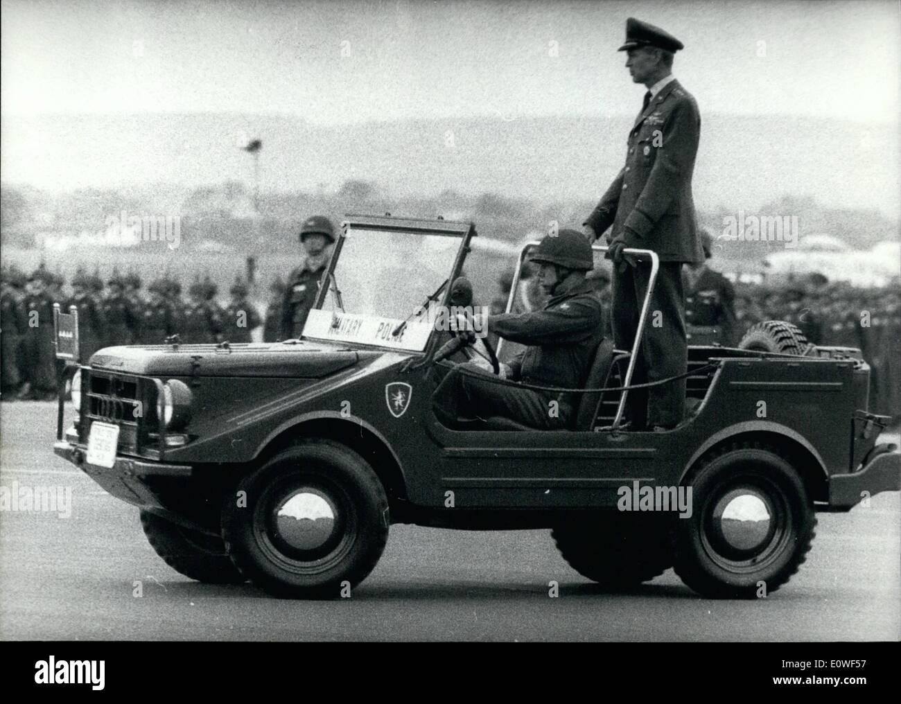 Oct. 10, 1962 - Farewell Parade for General Norstad: Troops from Canada, France, the USA and Germany participated in the farewell parade for the retiring NATO Supreme Commander General Lauris Norstad held on Wiesbaden Air Base today. Photo shows General Norstad on his reviewing jeep trooping the line of troops. Stock Photo