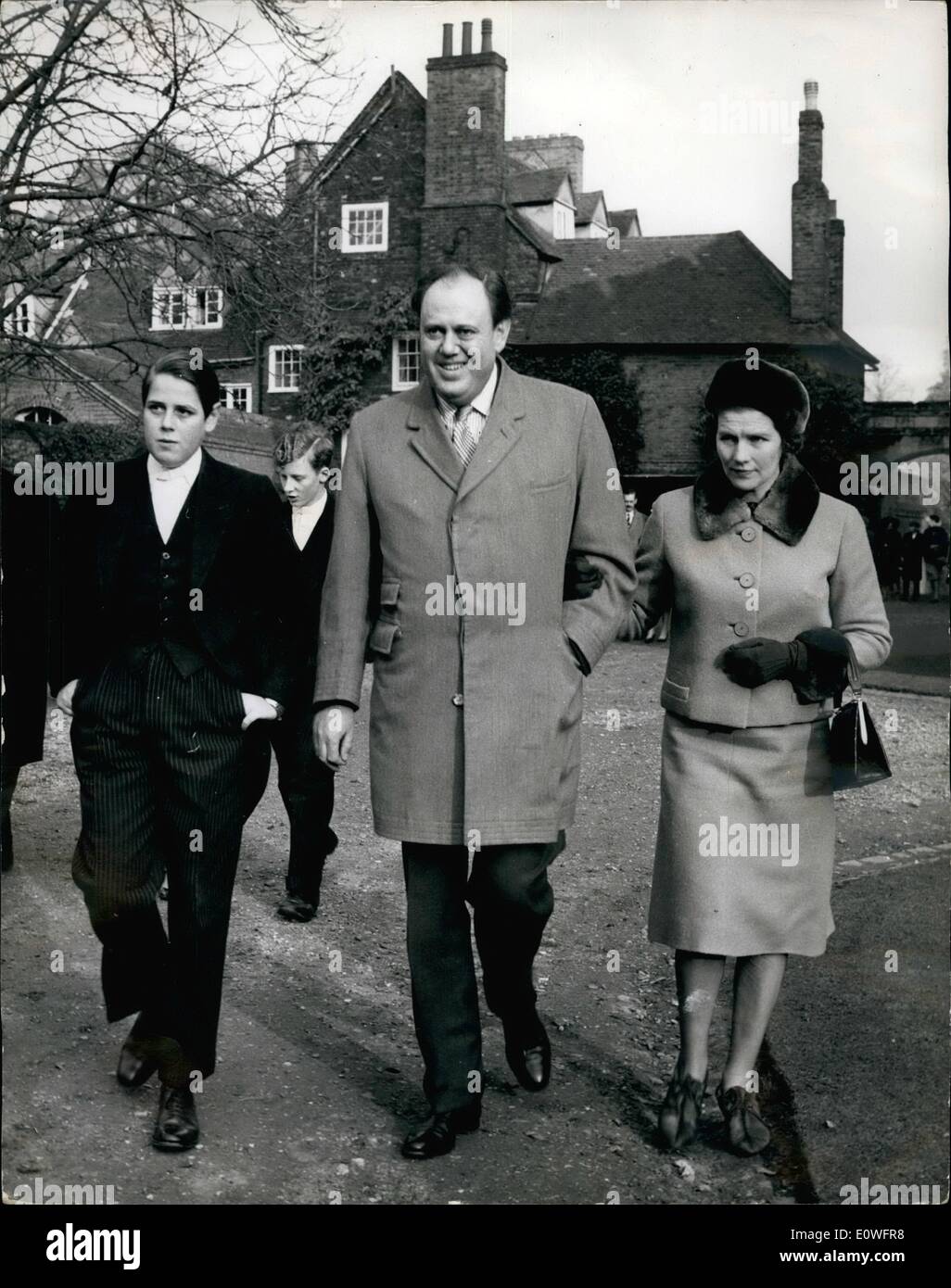 Nov. 11, 1962 - The Eton Wall Game Today.: The annual Eton Wall Game was once again played today at the public school when the Collegers and Oppodans teams met in the unexplainable struggle. Photo shows Minister of Agriculture Christopher Soames, his wife, and son Nicholas, leaving the grounds after the game today. Stock Photo