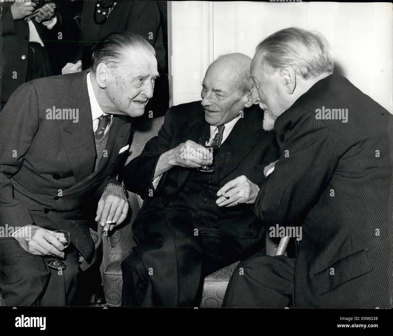 Nov. 11, 1962 - Literary Luncheon at the Dorchester.. animated conversation.. A Foyles Literary Luncheon was held this afternoon at the Dorchester Hotel in honour of Lord Boothey to mark the publication of his book ''My Yesterday - Your Tomorrow''.. Photo shows Talking together at the luncheon this afternoon are L-R:- Somerset Maugham; Earl Attlee and Sir Compton Mackenzie. Stock Photo