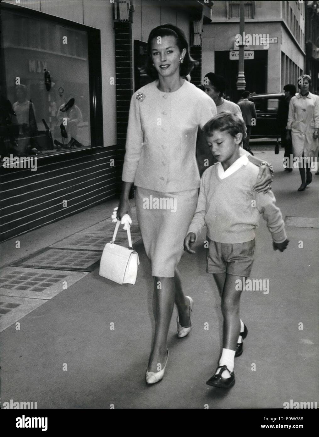 Sep. 09, 1962 - Dawn Addams and son in London: A charge of abduction was lodged against British actress Dawn Addams by her husband, Prince Vittorio Massimo, in Milan yesterday. Prince Massimo, who is separated from Miss Addams, has custody of their seven year-old son Stefano except for one month a year. Miss Addams took her son for a holiday and he was due to be returned to his father at midnight on Monday. But his mother had arrived in England and took action to make him a temporary ward of the High Court. He cannot be taken out of Britain without the Court's permission Stock Photo