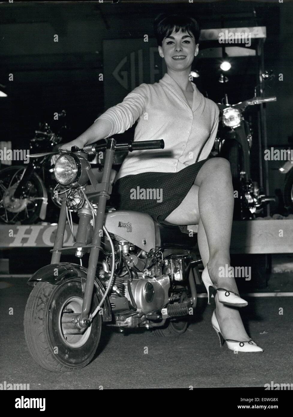 Sep. 09, 1962 - Press View - Motor Show - At Earls Court..Dawn Tries Out The Honda ''Monkey''..A press view was held today at Earls Court of the Cycle and Motor Cycle Show- Which Opens There Tomorrow.. Keystone Photo Shows- Model Dawn Maxey - On the New Japanese Honda ''Monkey'' 50 C.C. - Machine which does 45 m.p.h. - at 160 m.p.g. a Real Miniature but practical motor cycle...It is now yet priced. Stock Photo
