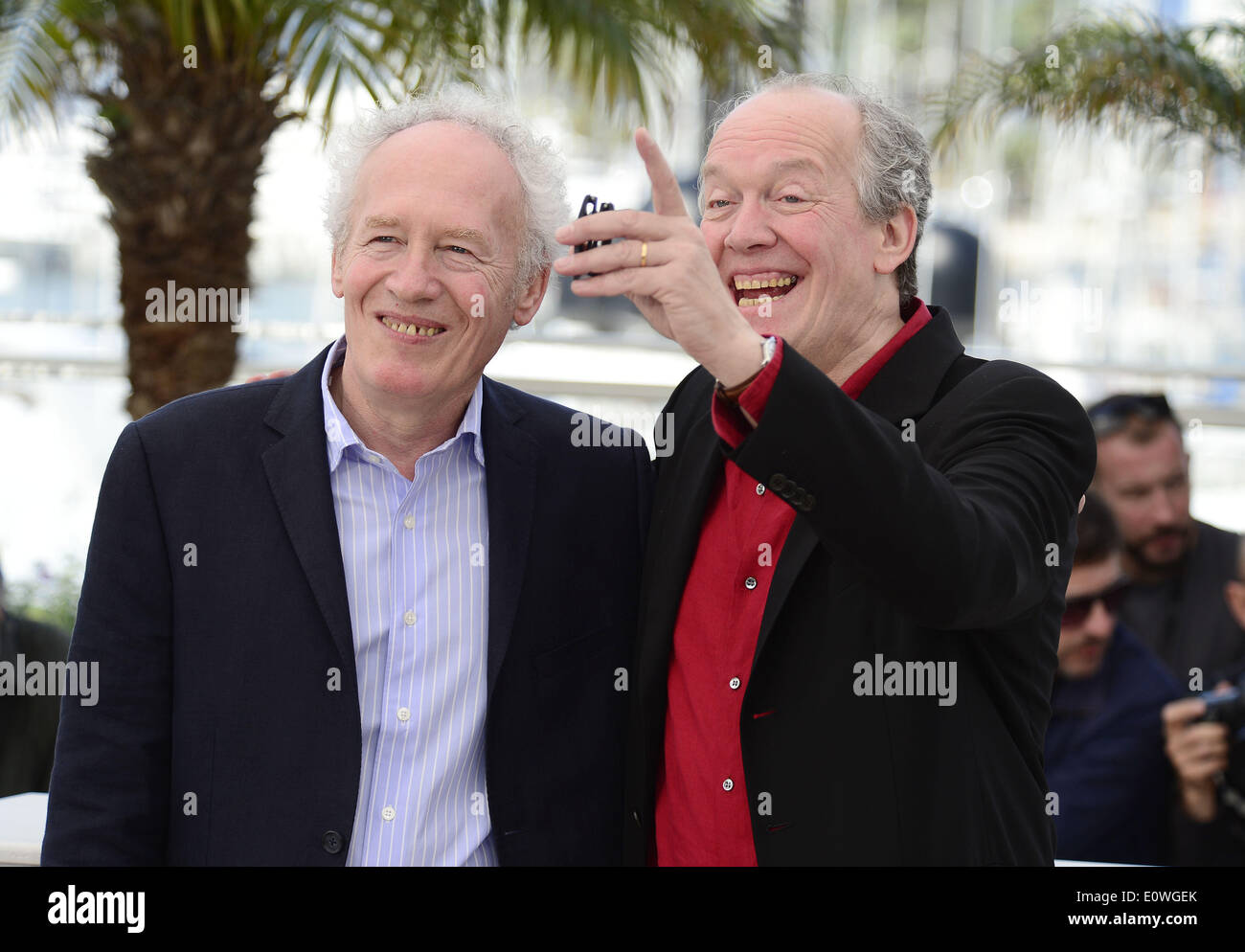 Cannes, France. 20th May, 2014. Belgian director brothers Jean-Pierre Dardenne (L) and Luc Dardenne pose during the photocall of 'Two Days, One Night' at the 67th Cannes Film Festival in Cannes, France, May 20, 2014. The movie is presented in the Official Competition of the festival which runs from 14 to 25 May. Credit:  Ye Pingfan/Xinhua/Alamy Live News Stock Photo