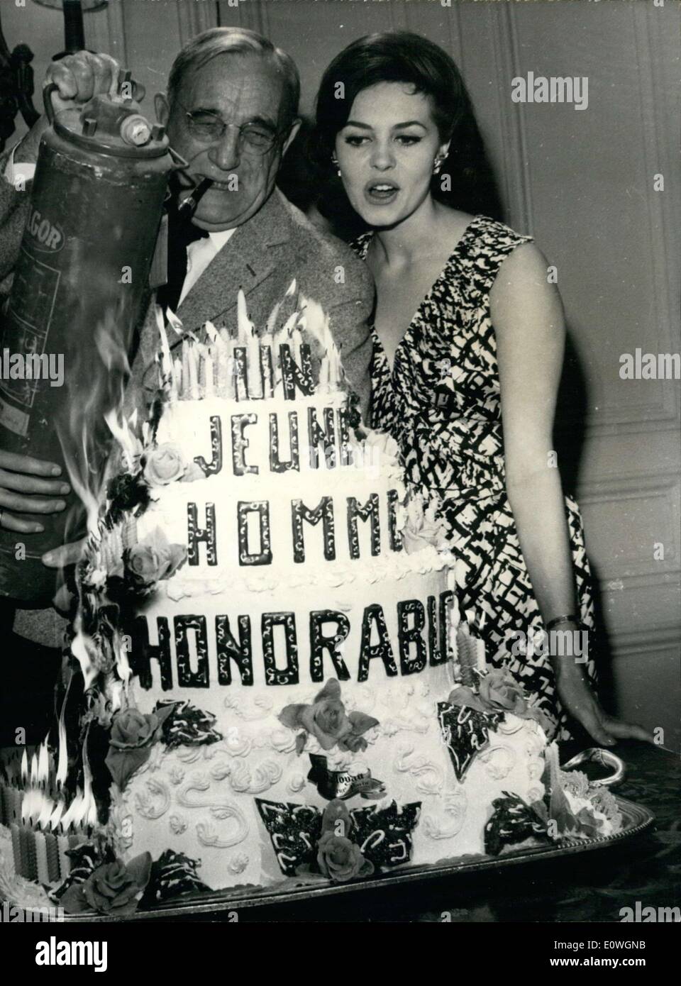 Sep. 15, 1962 - They are on the set of ''A Young Honorable Man'' at Jenner studio. Vanel's 70th birthday cake had 327 candles on it. Stock Photo
