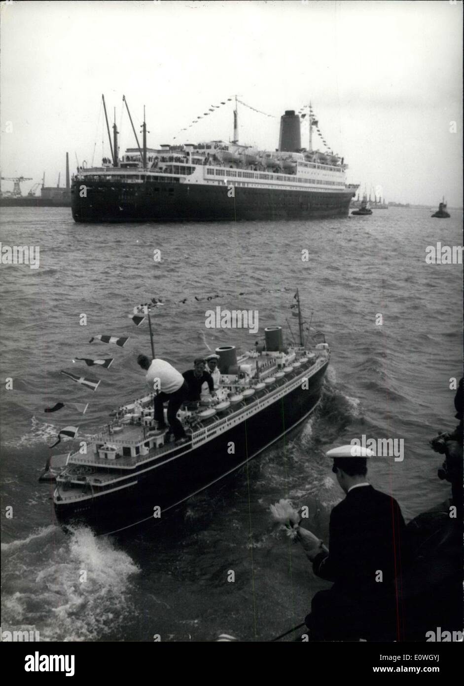 Sep. 24, 1962 - Two ships named ''Bremen''. Met on the Weser, today. The 'little Bremen', a and the 'big Bremen' which-coming from New York in Bremerhaven. Ops: the biggest original ship-model able to swim constructed by Gunter Bos and Gunter Buse from Osnabruck within ten years. Both are neither experts nor craftsmen. Here the 'little Bremen' is putting to sea to welcome the big sister at the arrival in Bremerhaven. Stock Photo