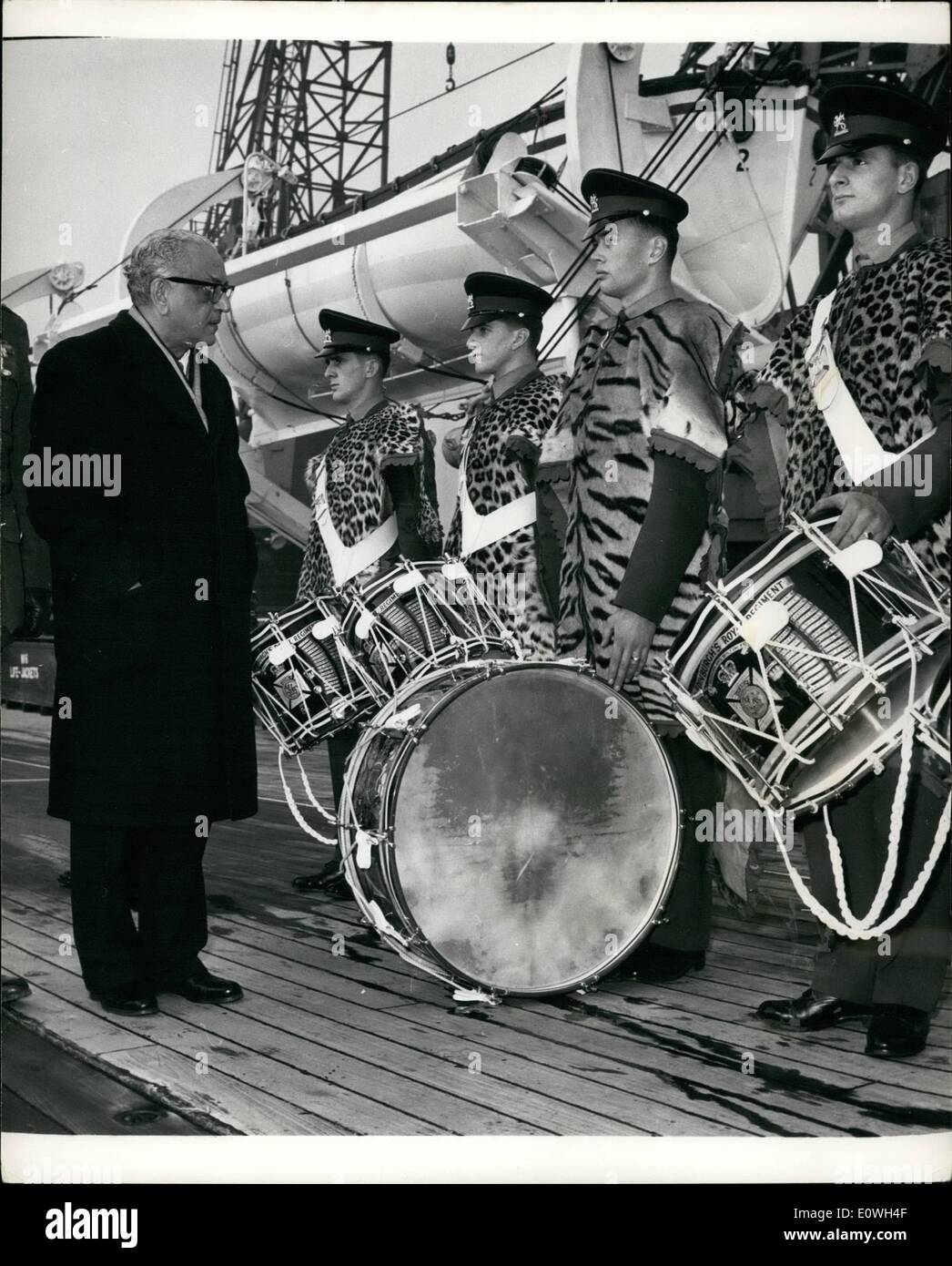 Dec. 12, 1962 - Tiger and Panther Skins From Mr. Nehru - For The Duke of Edinburgh's Royal Regiment.. At a ceremony aboard the T.S. Oxfordshire at Southampton - five tiger and panther skins were handed over by Mr. M.C. Chagla, the Indian High Commissioner in London - on behalf of Mr. Nehru - to the 1st. Bn. Duke of Edinburgh a Royal Regiment.. They were sent at the instigation of former Sgt. Major Leslie Hodges - for use by the Regimental drummers - as he thought the original skins were getting rather 'tatty'.. Keystone Photo Shows:- The High Commissioner - Mr Stock Photo
