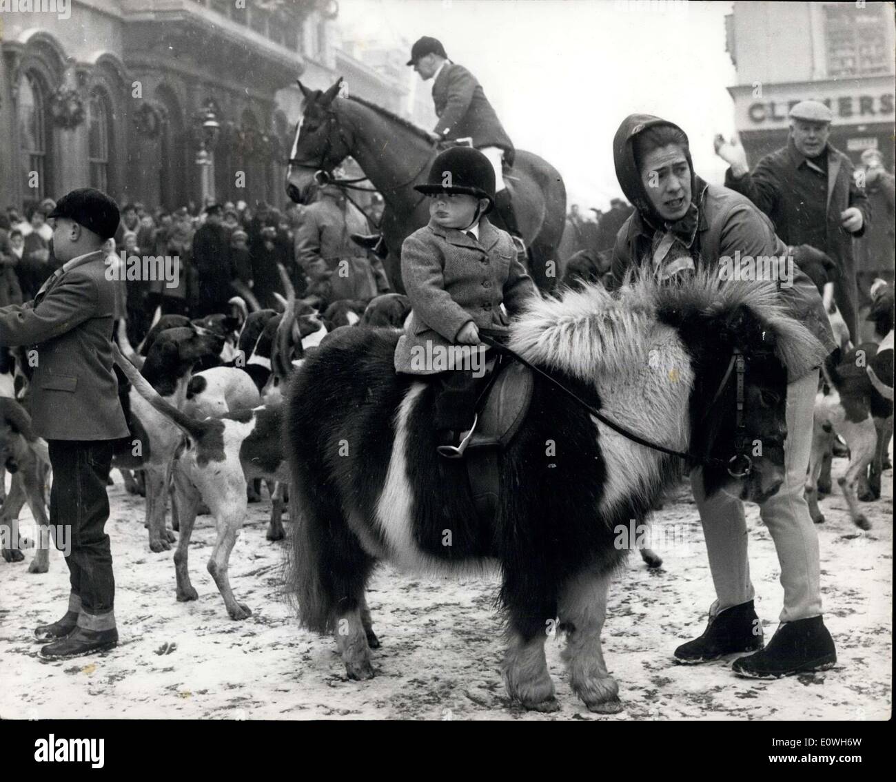 Dec. 27, 1962 - Nicholas - The Eighteen Months Old ''Huntsman'' - Complete With Jodhpurs -And Nappies: Sitting lordly on his Shetland Pony - is eighteen months old Nicholas Selby -when about to take part in the meeting of the Quorn Hunt - at Loughborough, Leics., yesterday Nicholas - the son of 10 year old Mrs. Doris Selby -also wore ''nappies'' - enough to make any veteran in hunting pink-see red.. But the padding enabled the tiny toddler to ride with the hunt for an hour - without getting saddle sore. Stock Photo