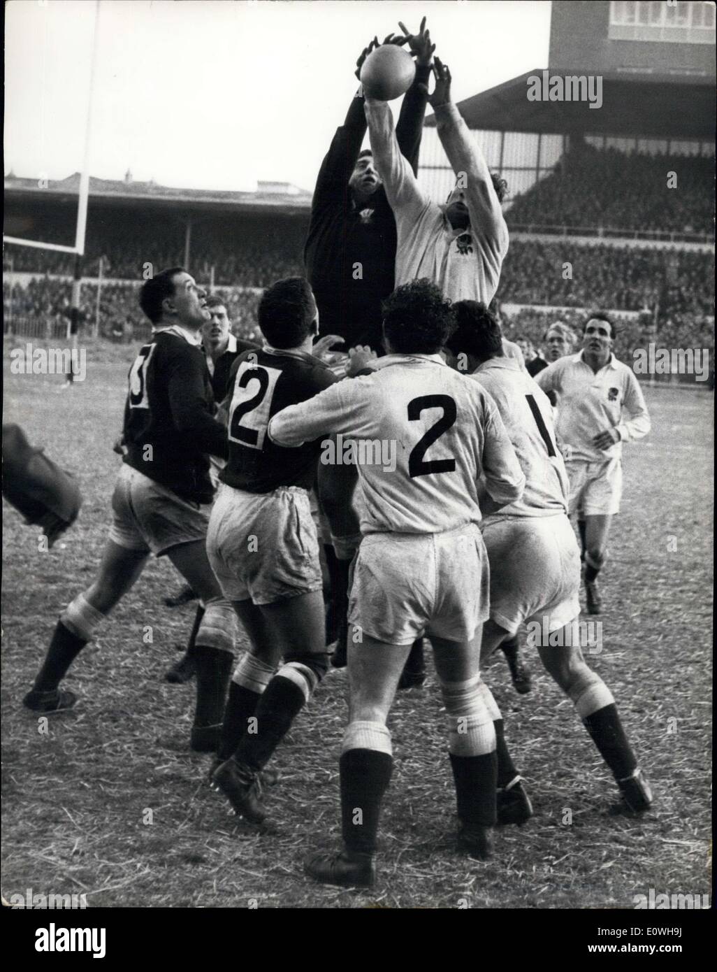 Jan. 20, 1963 - England Beat Wales - The England, team best Wales by 13 points to 6 - on the frozen Cardiff Arms Park Pitch -Yesterday. Keystone Photo Shows:- Brian Price and JE Owen Jump in line-out during the match at Cardiff. Stock Photo