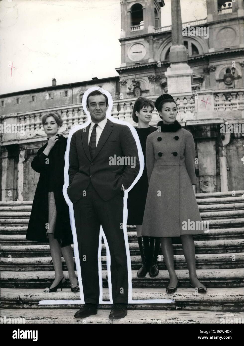 Jan. 01, 1963 - Sean Connery famous British actor arrive in Rome today, accompanied by actresses Gillian Evann, Seyna Seyn and Olivia Hill to continue his Italian pulbicity tour for the launching of his last film ''Agent 007''. Photo shows Sean Connery pictured in Piazza di Spagna with the tree actresses. Stock Photo
