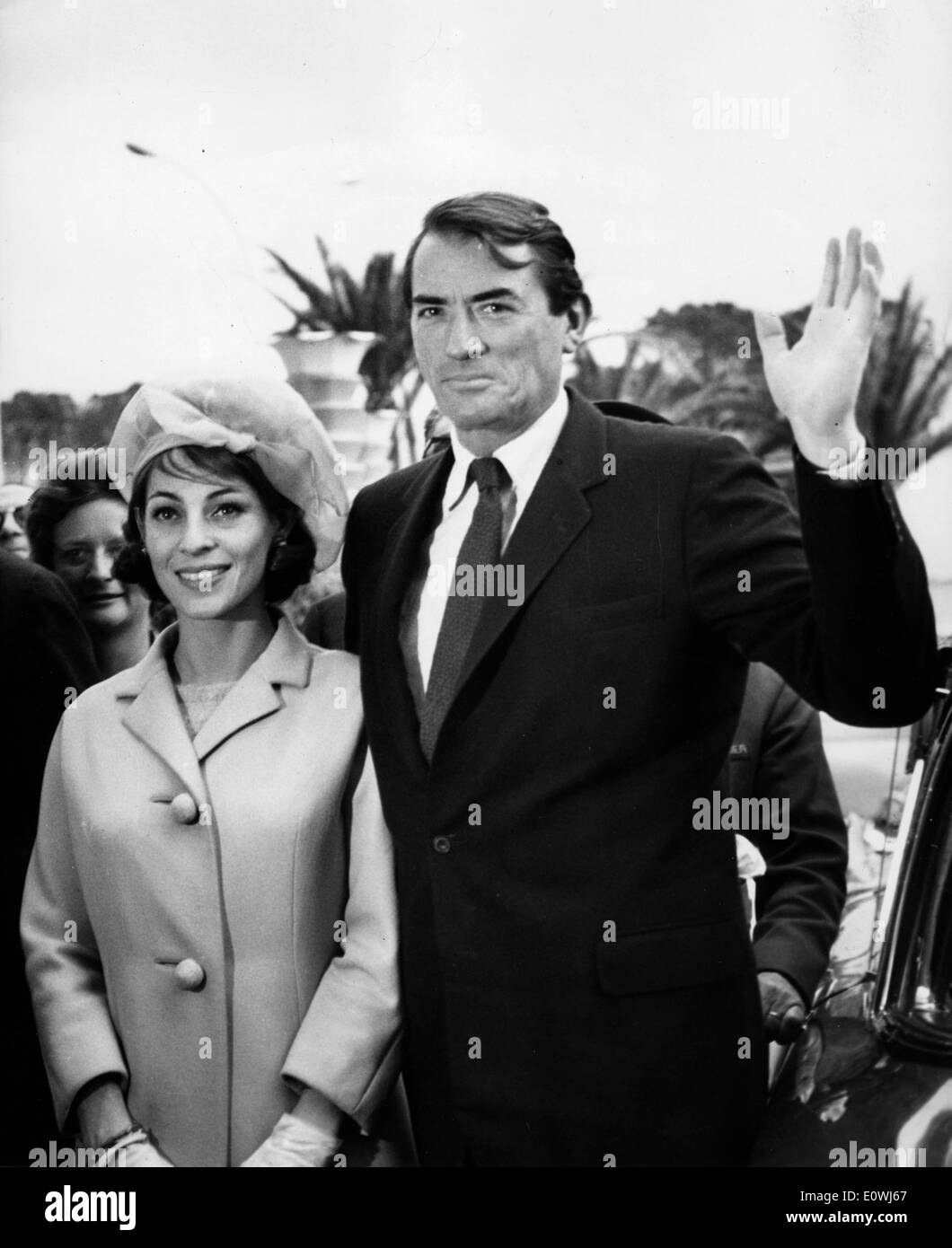 Actor Gregory Peck arriving at the Cannes Film Festival with his wife Veronique Stock Photo