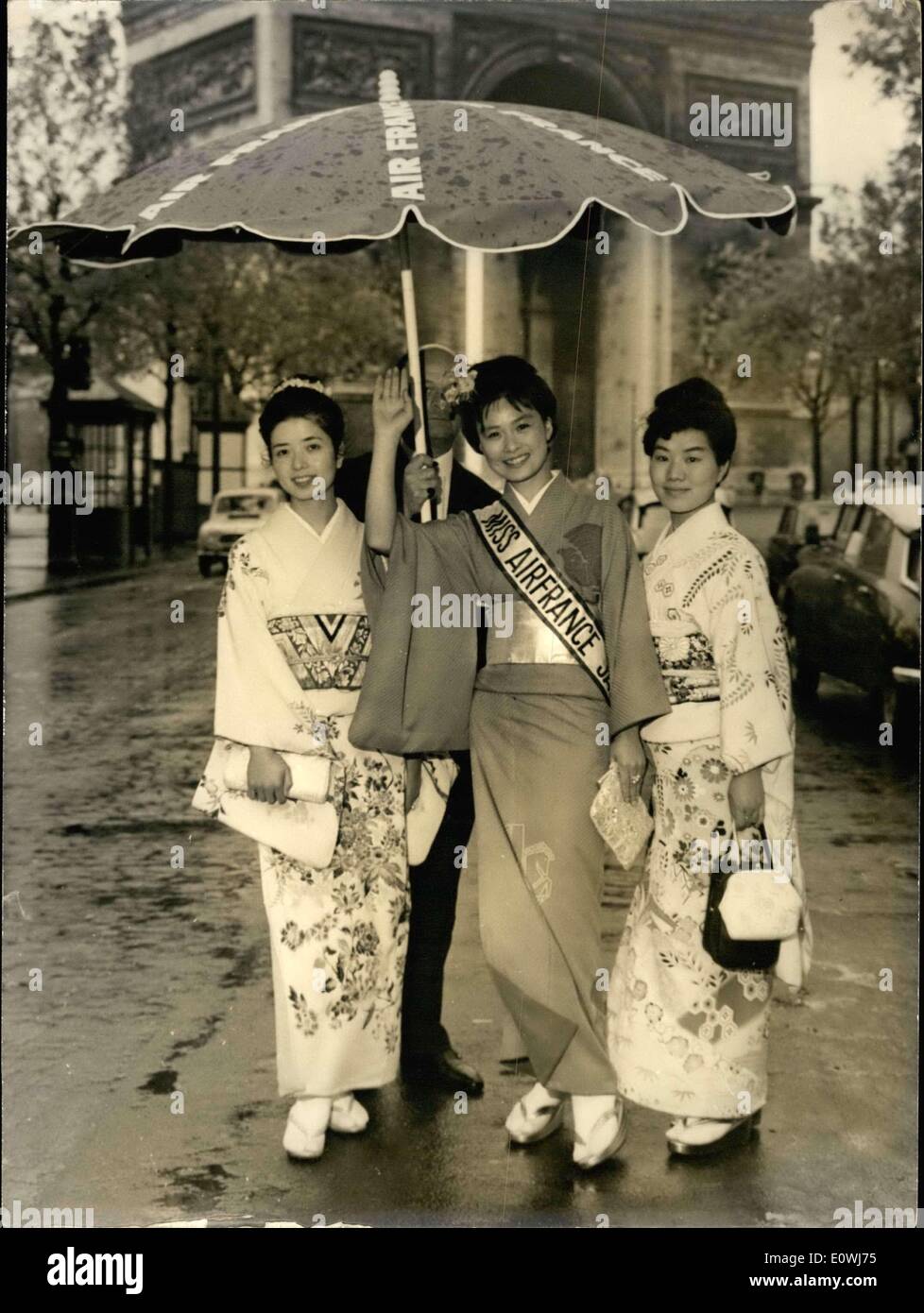 May 23, 1963 - In Japan, the beauty contest are always important evens, but the title of 'Miss Air France Japan' is the most sought after. The contest is organized by a large movie production company along with Air France. The prettiest Japanese girl elected to the 1963 title is Melle Sumiko Oyaizu, 20; she modeled for a large fashion company. During her time as Miss Air France Japan, she was invited to tour Paris and France. She arrived this morning, accompanied by two friends. Here is Melle Sumiko with Suzuki Fumiko (left) and Matsuoka Fukiko (right) Stock Photo