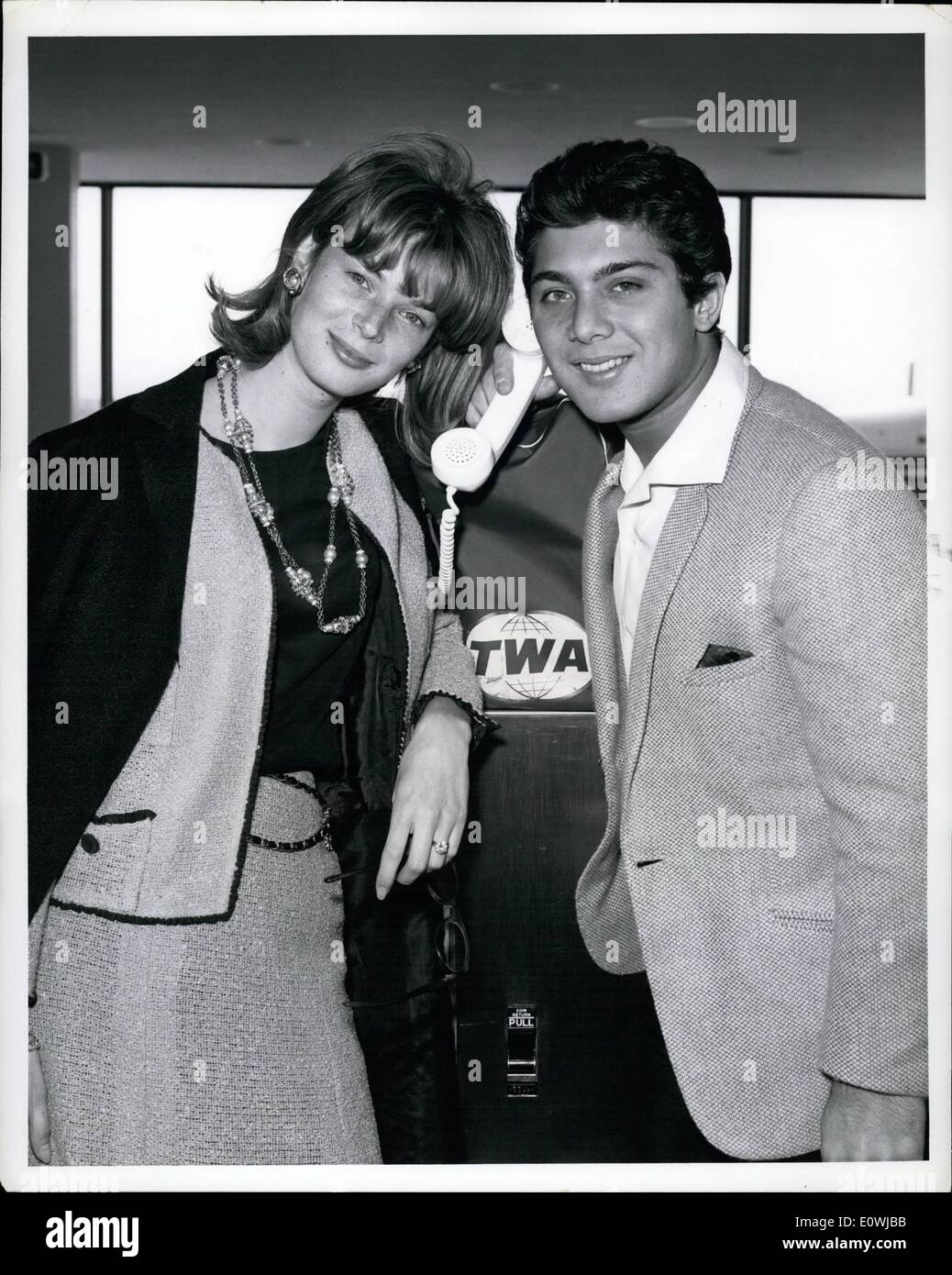 Mar. 03, 1963 - Singer Paul Anka is shown with bride, former model Anne De Zogheb in Trans World Flight Center, prior to boarding TWA Startream to Los Angeles on a combination honeymoon business trip. He will discuss a film contract with motion picture executives. Credits: TWA Stock Photo