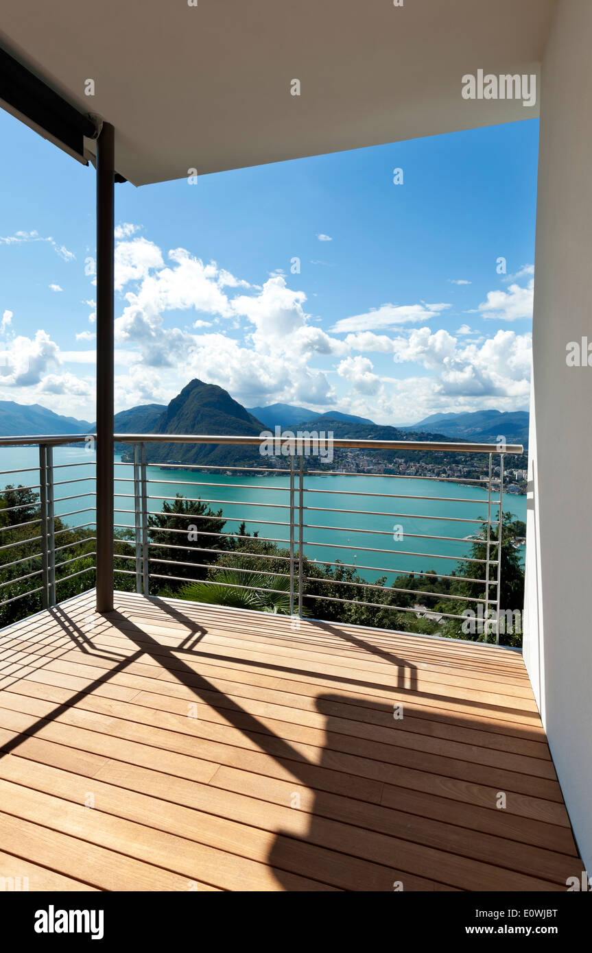 Modern apartment, balcony overlooking the lake Stock Photo