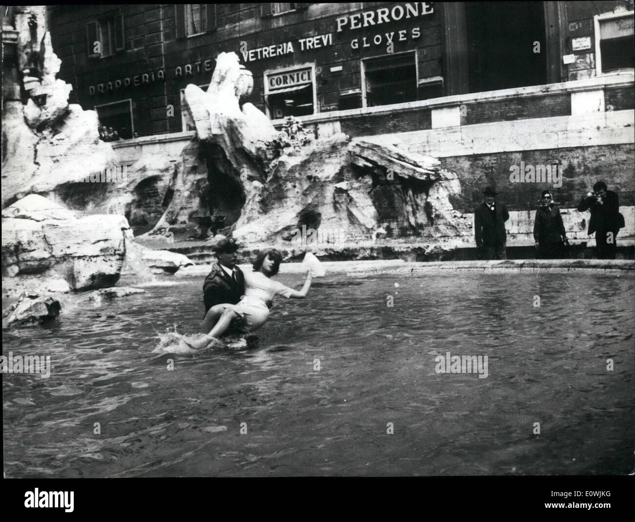 Mar. 03, 1963 - Cindy Carol the american young star who is filming in ''Gidget goes to Rome'' the teenager in touristic visit to the Capital, shooted in the Fountain of Trevi, one on one of 'dolce vita', an Anita Erberg also Cindy Carol jumps in it but this time she is arrested for steeling coin in the Fountain and brought to the American embassy. Stock Photo